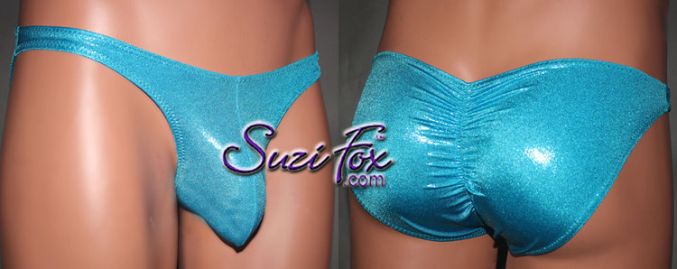 Mens Posing suit with Elongated Pouch Front, Wide Strap, Gathered Full coverage Rear Bikini - shown in Turquoise Metallic Mystique Spandex, custom made by Suzi Fox.
• Gathered rear accentuates the butt!
• Available in black, red, turquoise, green, purple, royal blue, hot pink/fuchsia, baby pink, baby blue, silver, copper, gold Metallic Mystique spandex or any fabric on this site.
• Standard front height is 7 inches (17.8 cm).
• Available in 3, 4, 5, 6, 7, 8, 9, and 10 inch front heights.
• Wear it as swimwear OR underwear!
• Made in the U.S.A.