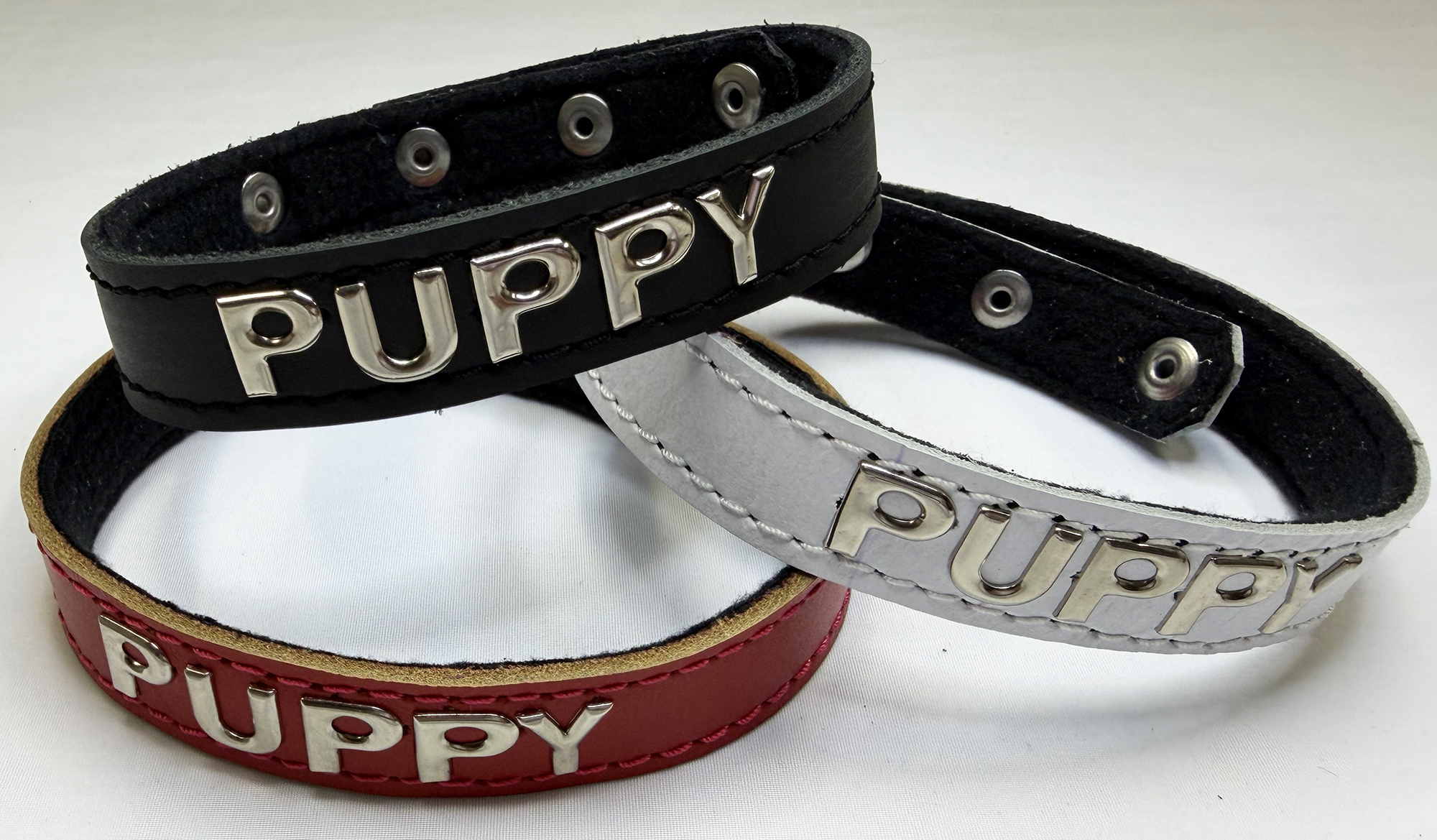puppy-red-white-black-collars-stacked.jpg