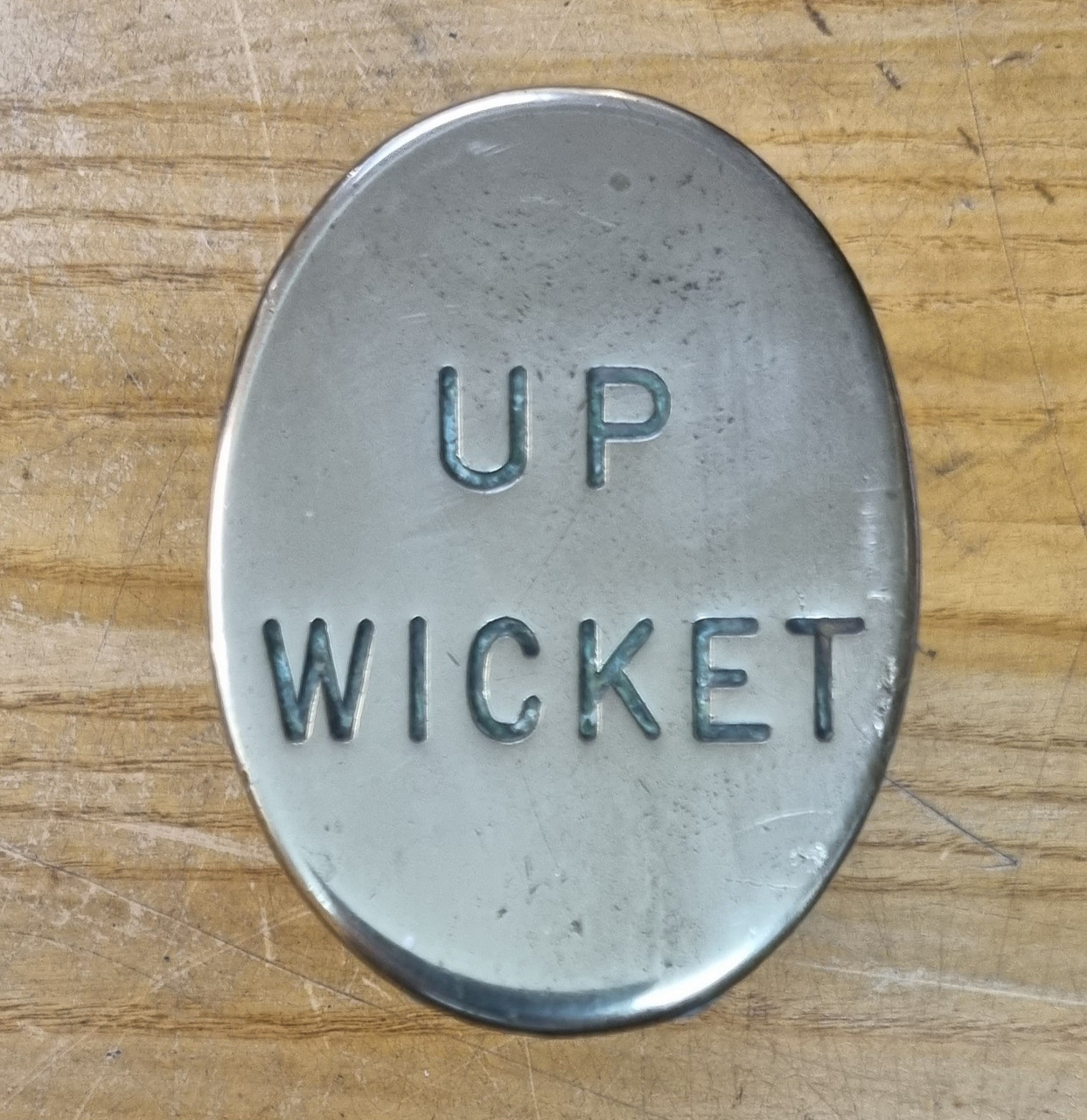 RA 7006  G.W.R. SMALL BRASS OVAL "UP WICKET" PLATE