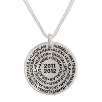 Back view of silver custom stamped necklace for coach , with roster and season years 