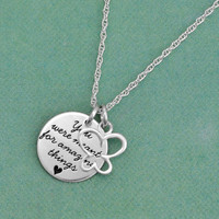 Sterling silver stamped Your Saying On A Necklace shown with happy butterfly charm, personalized with your own message