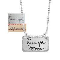 Sterling silver rectangle jewelry engraved with handwritten note & signature from Mom, shown on white with original handwriting used to personalize it