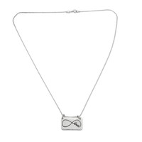 Sterling silver rectangle jewelry made from handwriting, shown on white