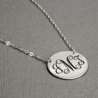 Silver monogram necklace, shown from side