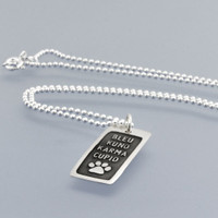 Side view of custom silver Etched Paw Family Necklace, personalized with 4 pet names & paw print image