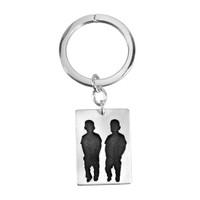 Mother's day gift with silhouette of kids on a silver Key Ring