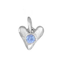 Sculpted Hearts Birthstone Charm in fine silver, close up showing birthstone