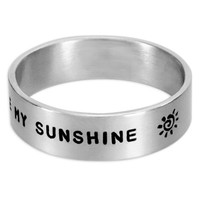 Silver custom wide band ring hand stamped with the words, "You are my sunshine"