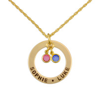 Gold custom hand stamped circle necklace personalized with kids names and Swarovski birthstones, shown on white