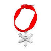 Custom Hand stamped fine pewter snowflake ornament, personalized with your message, shown on white