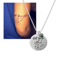 custom Silver Disc Handwriting Necklace, with photo of tattoo used to personalize it, on a 7/8" disc with silver heart swirl birthstone charm