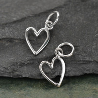 silver Tiny heart charm to add to necklaces or bracelets