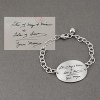 Large silver oval handwriting bracelet showing actual handwriting used to make the bracelet