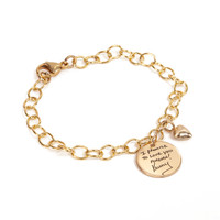 Personalized gold charm bracelet, custom engraved with note in husband's handwriting, with round disc charm & gold puffed heart, shown from the side on white