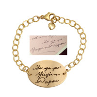 Gold memorial bracelet with your loved ones' actual handwriting, shown with original handwritten note used to personalize it