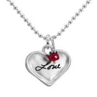 Sterling silver small heart for custom handwriting on necklace with birthstone, shown close up on white