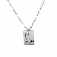 Necklace with handwritten note on custom silver rectangle tag for man or woman, shown on white