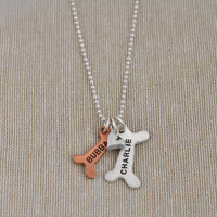 Handmade sculpted silver and copper dog bone charms