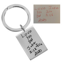 Silver key chain gift for Dad engraved with kids' actual signatures, showing original handwriting, on white background