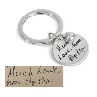 Custom handwriting sterling silver key chain, shown with original handwritten note from Pop Pop used to personalize it, shown close up on white