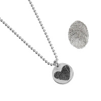 Custom Silver fingerprint necklace, personalized with loved one's actual fingerprint, shown on white, with the original fingerprint used to personalize it