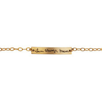 Dainty memorial bracelet with Mom's actual handwritten signature in gold, shown close up on white