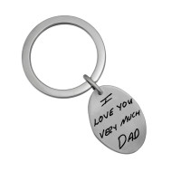 Silver oval handwriting signature key ring with your actual handwriting, shown on white