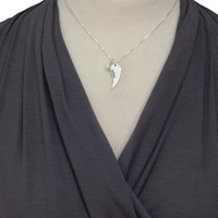 Model wearing custom Angel Wing with Pearl Necklace, personalized with child's stamped name
