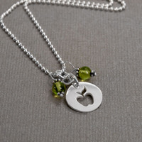 Apple & Peridot Necklace with silver apple teacher gift, shown from the side