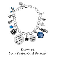 Bali Bead Triangle Dots, shown with other charms on our "Your Saying on a Bracelet" product