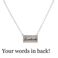 Sterling silver handmade Birds in Love Necklace on white wider view showing personalized back 