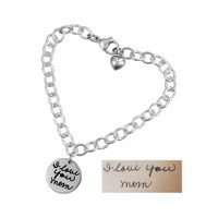 Custom Silver Handwriting Bracelet with handwriting of loved one or your own handwriting, shown with original handwritten note used to create it, on white