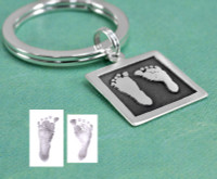 Custom sterling silver Key Ring with Etched Baby Prints, showing footprints