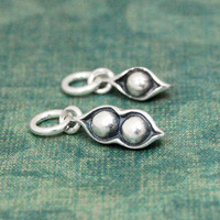 Silver Peas In A Pod Charm, shown close up from side