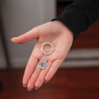 Model holding personalized Silver Square Monogram Key Ring, customized with your monogrammed initials NKJ
