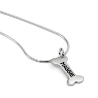 Sterling silver dog bone charm with hand stamped name "Maggie", shown from the side on a sterling silver snake chain