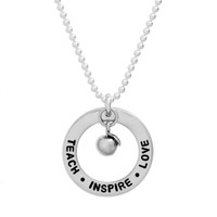 Well Loved Teacher on a Circle, hand stamped sterling silver disc with heart charm, with message Teach Inspire Love, close up