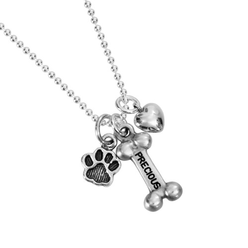 custom Sterling Silver Dog Bone Necklace, personalized with hand stamped dog name, silver Small Paw Charm, and silver puffed heart charm.