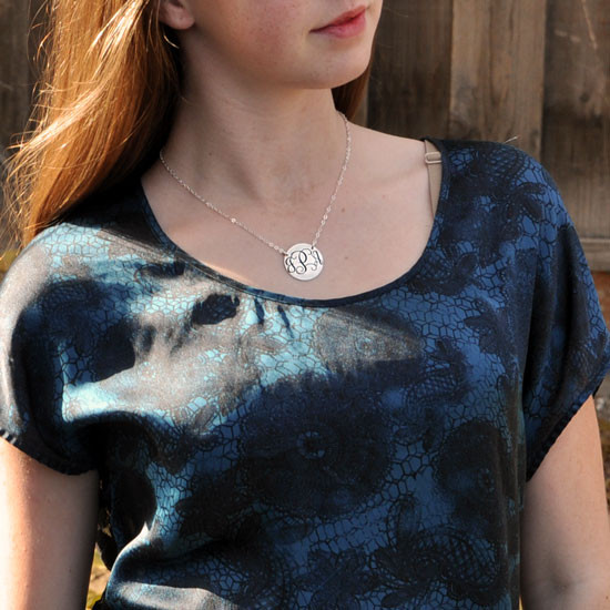 Silver monogram necklace, shown on model