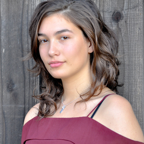 Model wearing Custom Silver Handwriting Mom Tag Necklace, personalized with child's handwritten signature, with silver puffed heart charm