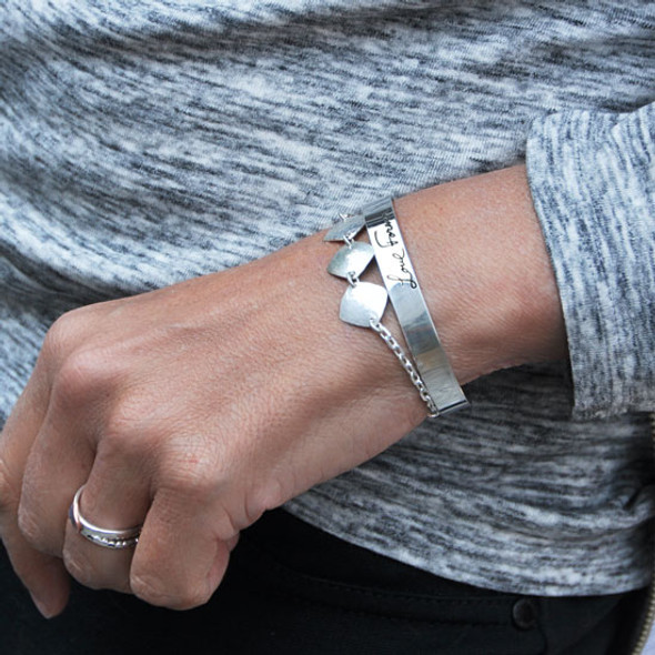 Stacked with a diamond charm bracelet