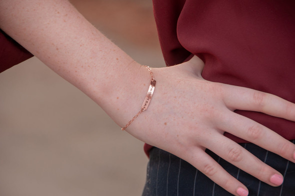 Dainty bracelet with your actual writing in rose gold, shown on model close up