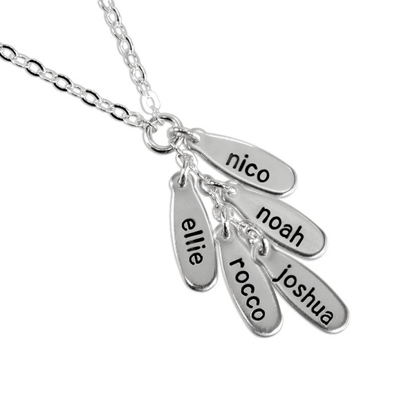 Personalized Silver Cascade Necklace, hand stamped with the kids' names, shown close up on white