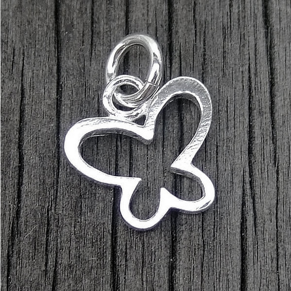 Silver Charm showing Happy Butterfly