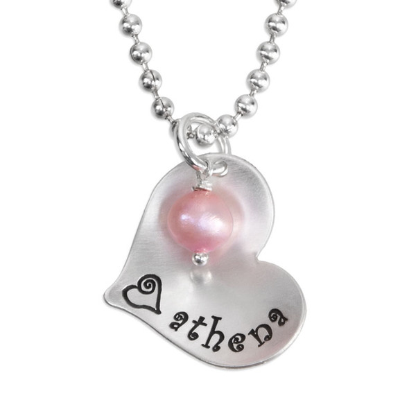 Scooped Silver Heart with Freshwater Pearl custom necklace, hand stamped with kid's name, shown on white