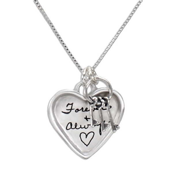 Large silver heart handwriting necklace with keys to your heart, shown close up on white