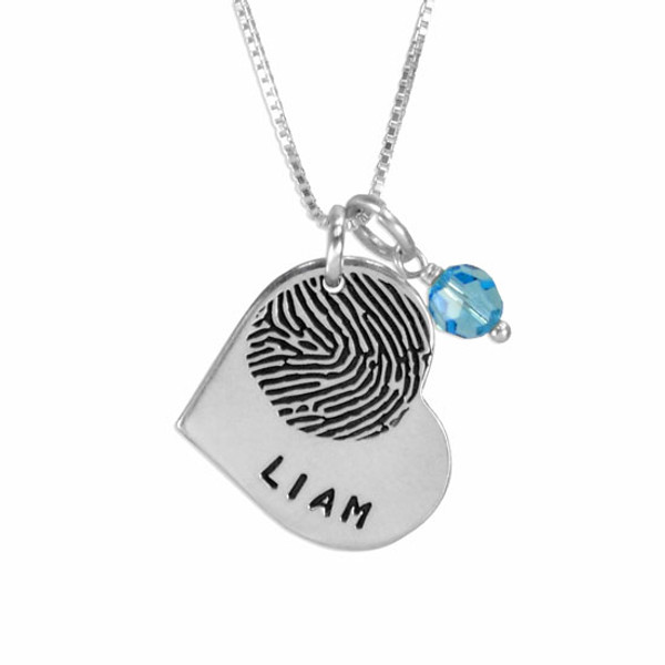 Personalized Silver Heart Fingerprint Necklace with Birthstone, customized with your loved one's actual fingerprint, & stamped with a name, shown close up on white