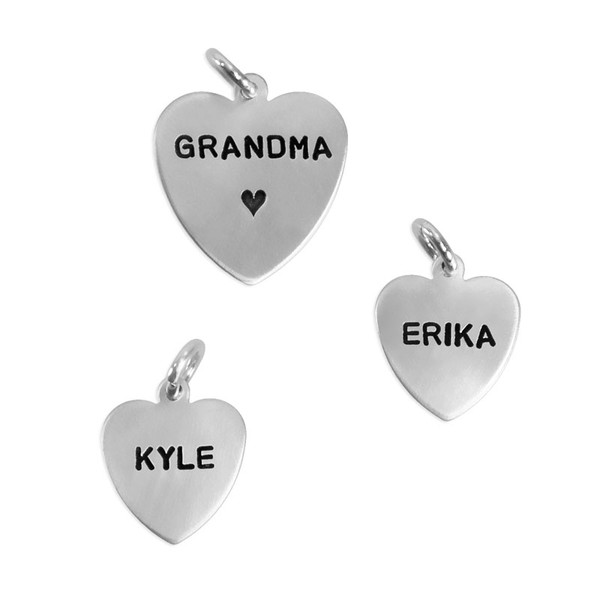 Hand stamped sterling silver heart charms with Block Upper font in 1/2" and 5/8" sizes