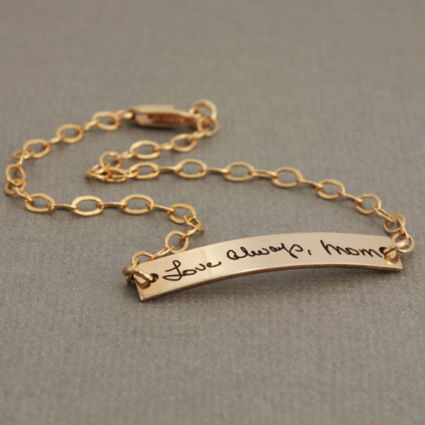 Dainty bracelet with your actual writing in gold, shown from the side