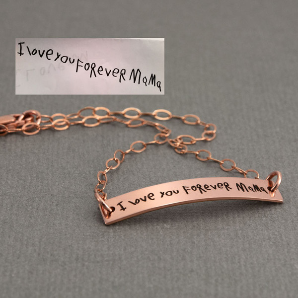 custom rose gold dainty bracelet with your actual writing, shown from the side with the original handwritten note used to personalize it